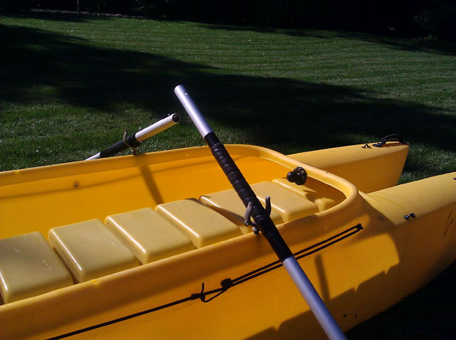 fishing kayak oars rowing position